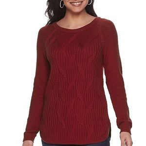 Red cable knit sweater